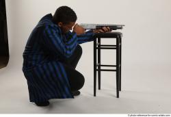 Garson KILLMASTER KNEELING POSE WITH SHOTGUN